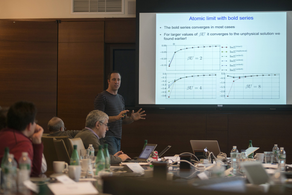 Michel Ferrero presenting a slideshow titled Atomic limit with bold series