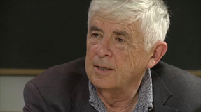 Alexandre Chorin in front of a chalkboard