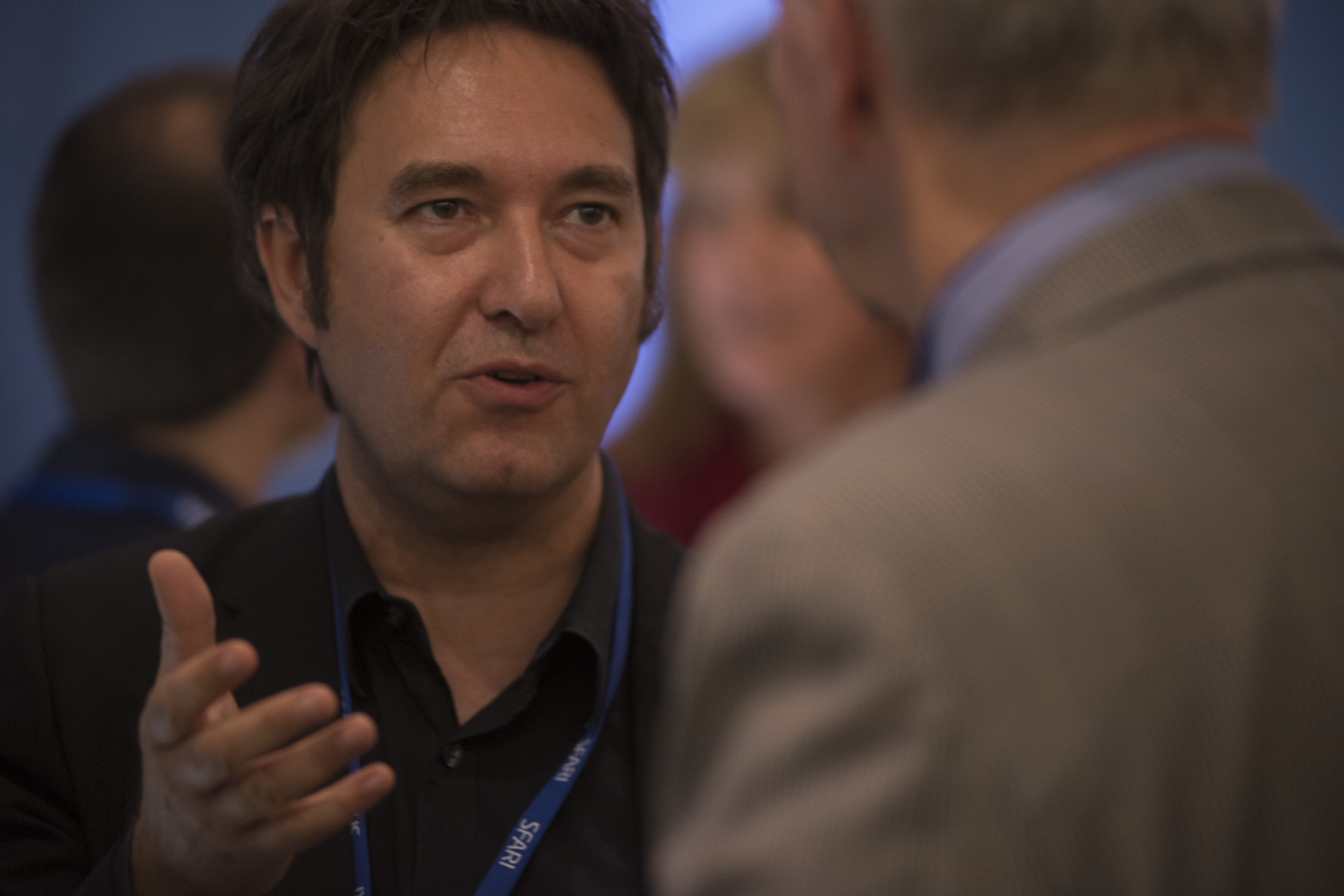 Man talking to another person