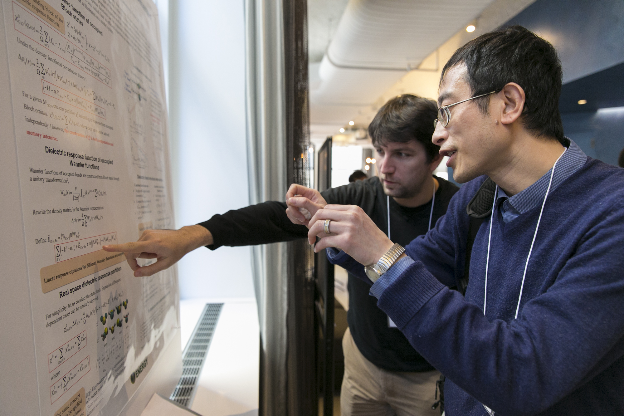 Two people looking at a presentation together
