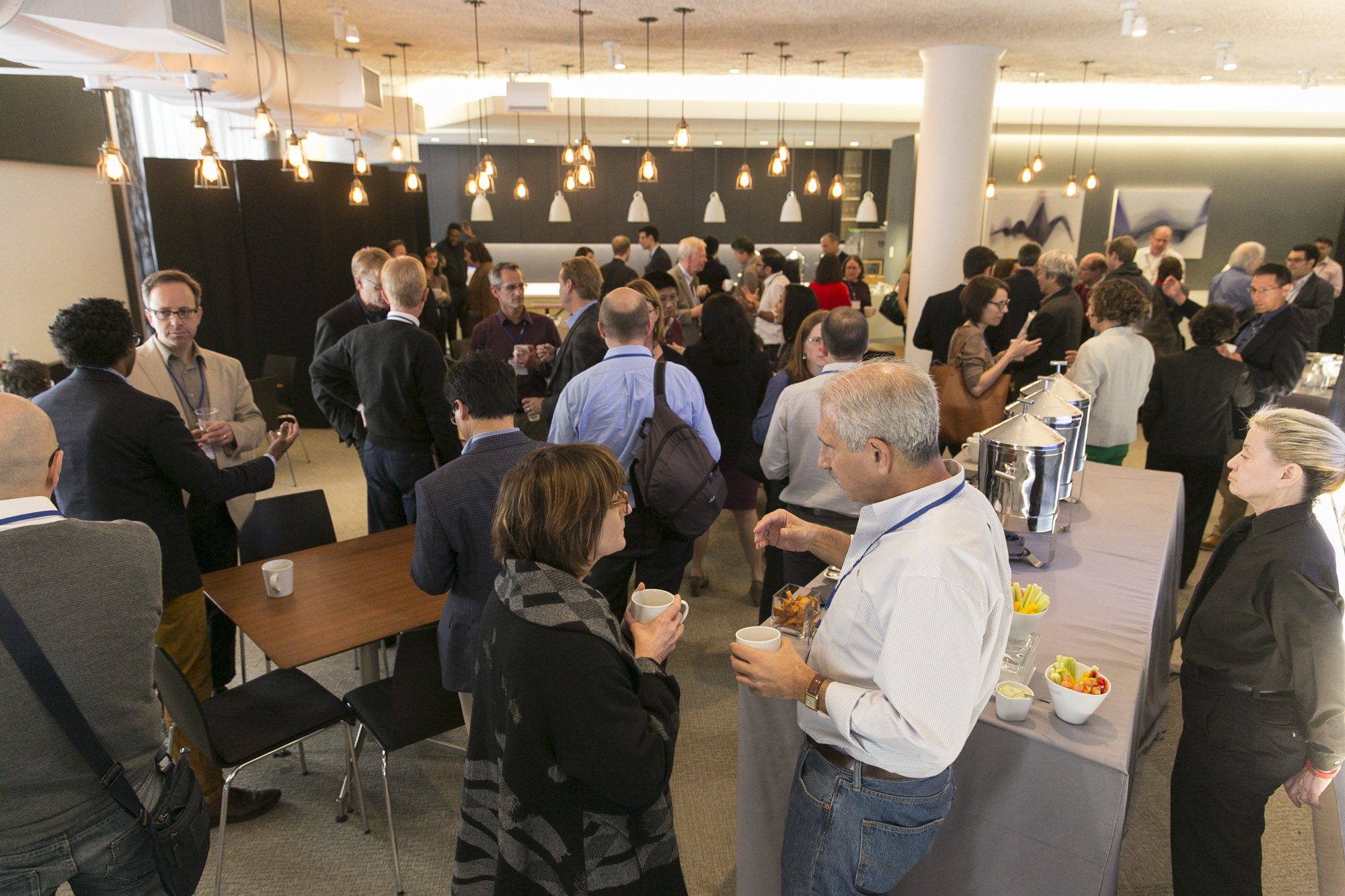 Crowd of people socializing together