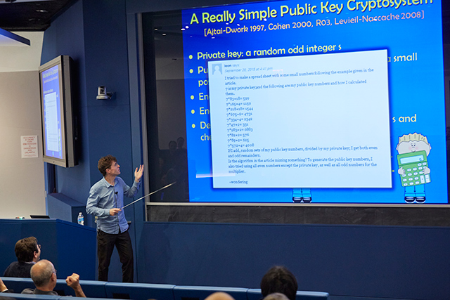 Oded Regev presenting a slideshow titled 