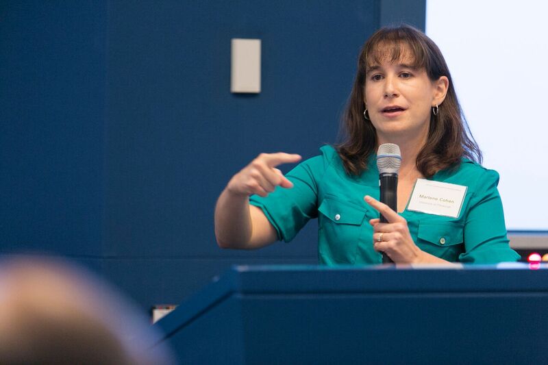 Marlene Cohen talking while gesticulating with her right hand