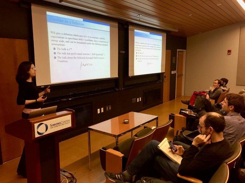 Woman presenting a slideshow that says checklist for a definition