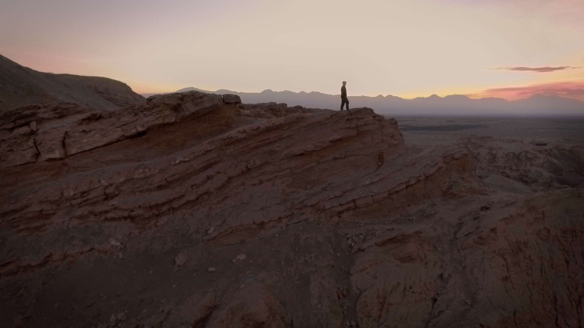 Photo of man on a rocky canyon