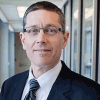 Portrait photo of Gene Robinson