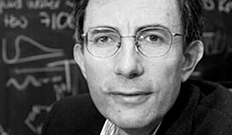 Dimitar Sasselov in front of a chalkboard