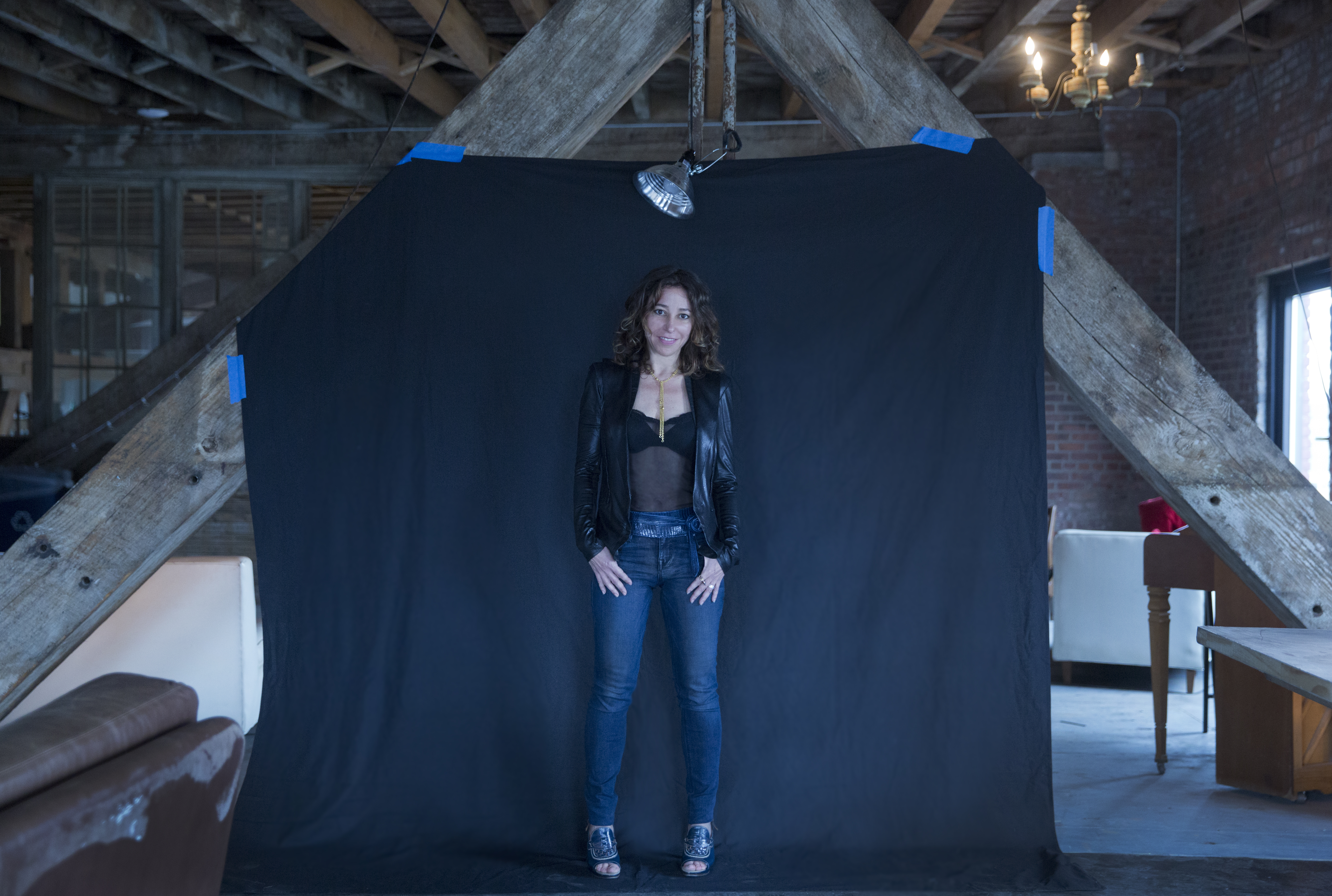 Janna Levin in front of a black cloth