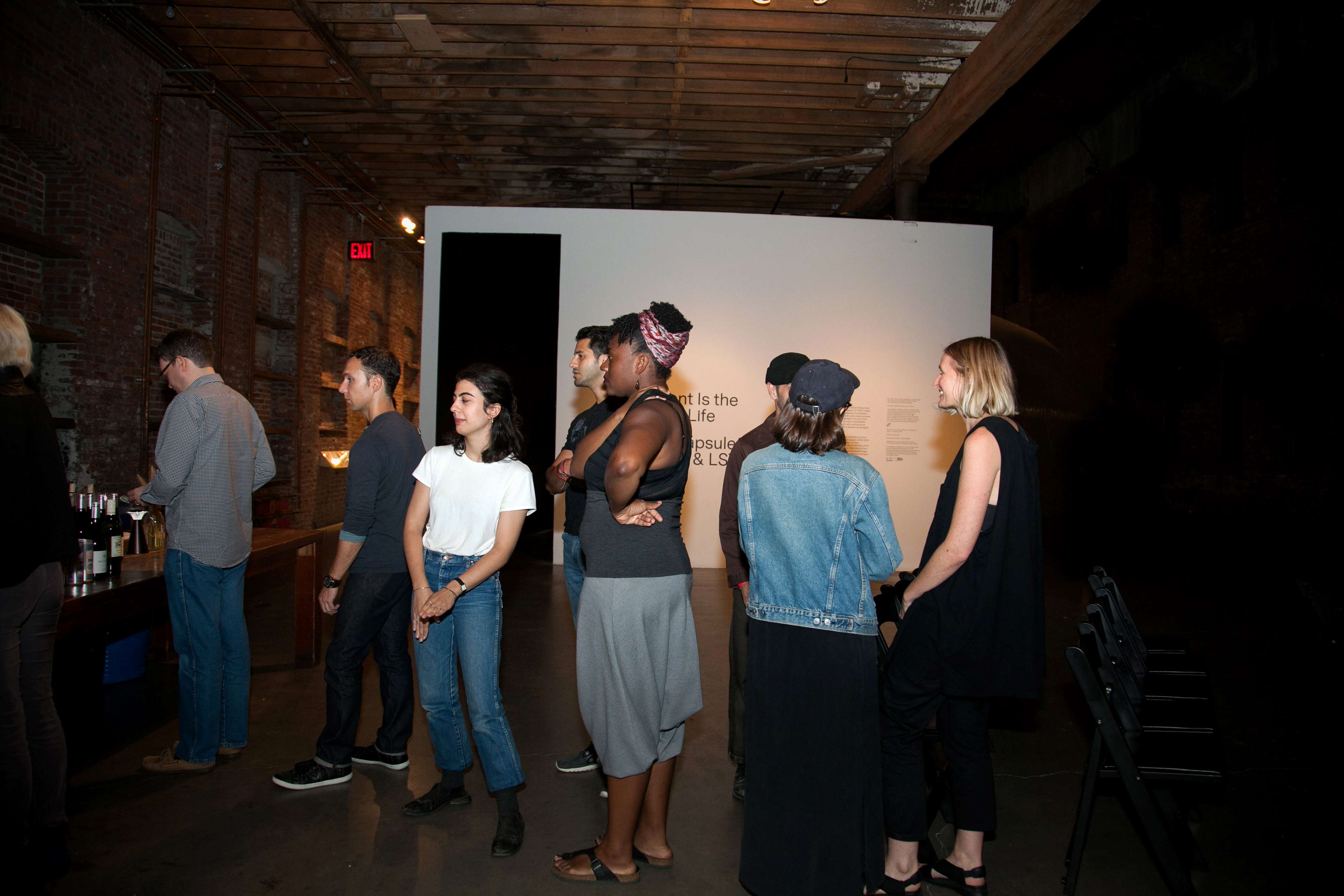 People standing in line for alcohol