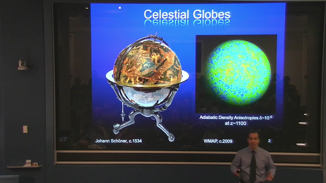 Man standing in front of a slideshow titled Celestial Globes