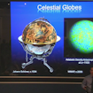 Man standing in front of a slideshow titled Celestial Globes