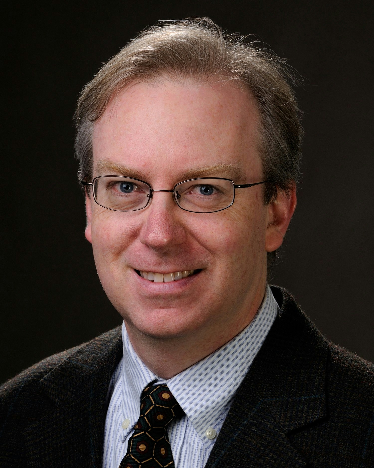 Portrait photo of Charles Kane