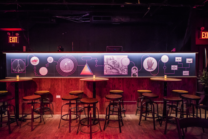 Science-themed imagery at Caveat, a new event space on the Lower East Side of Manhattan