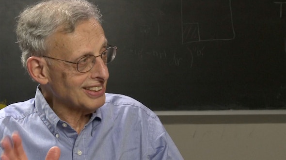 Elias Stein talking in front of a chalkboard