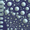Digital illustration of different sized white spheres floating on a purple background
