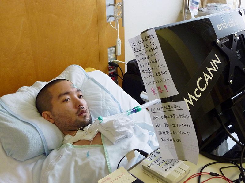Someone with a paralysing conditions such as motor-neuron disease who relies on technology to help them speak.