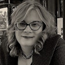 A portrait photo of Rebecca Oppenheimer.