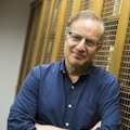 Lawrence J. Henderson Professor of Pediatrics Isaac Kohane is the new head of the new Department of Biomedical Informatics at Harvard Medical School. He is pictured in Countway Library in the rare books collection, the original big data, at HMS. Stephanie Mitchell/Harvard Staff Photographer