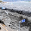 A photo of a large wave approaching Miyako City, Japan, after a magnitude 8.9 earthquake struck the area in Miyako, Japan, March 11, 2011.