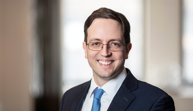 A portrait photo of Philip Mocz.