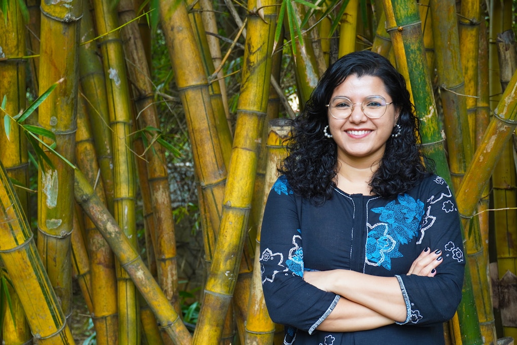 Portrait of Abhilasha Joshi taken in the gardens at the National Centre for Biological Sciences, Bengaluru, India.
