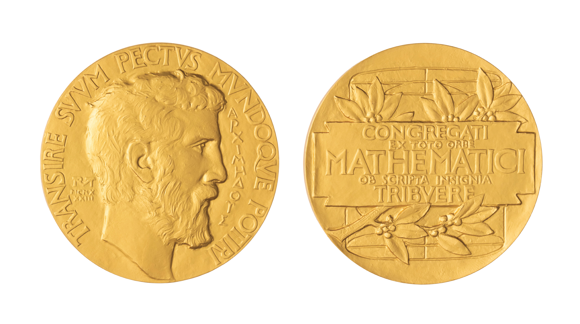 A photo of the front and back of the Fields Medal.