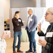 People talking during the break during the Pivot meeting.