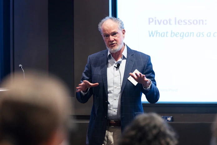 Photo of Alan Dorsey giving a presentation.
