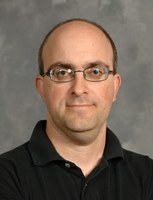 Headshot of SFARI Investigator Elad Schneidman.