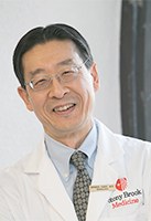 Headshot of SFARI Scientific Advisory Board Member Dennis Choi.