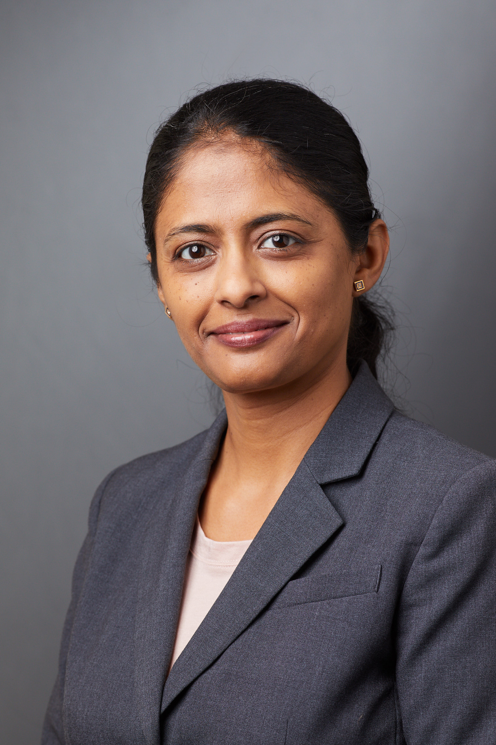 Headshot of Investigator Monika Jadi.